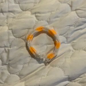 I am selling a cream cicle inspired bracelet.